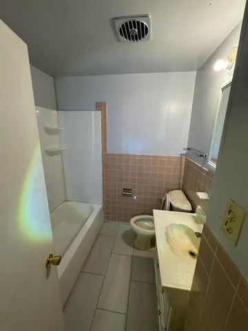 a bathroom with a sink and toilet