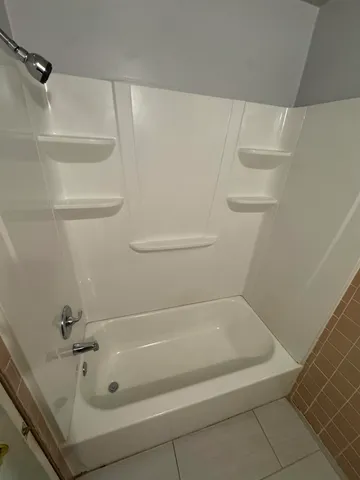 a bathroom with a bathtub