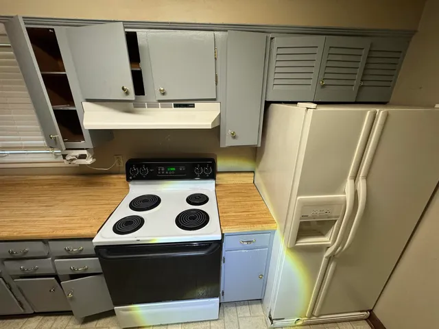 a view of living room with washer and dryer