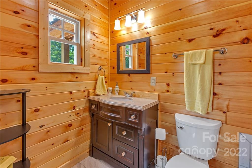 1299 Fox Rdg Trail Marion, NC 28752 - Photo 13 of 23 a bathroom with a sink and a toilet