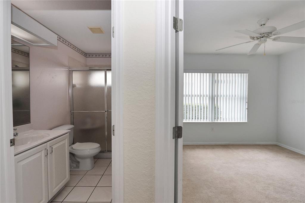 6318 Southwest 117th Loop Ocala, FL 34476 - Photo 28 of 60 a bathroom with a toilet sink and a mirror