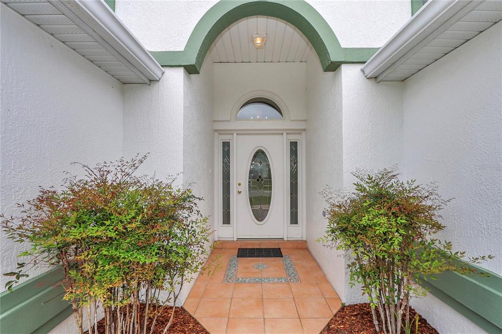 6318 Southwest 117th Loop Ocala, FL 34476 - Photo 3 of 60 a view of a door of the house