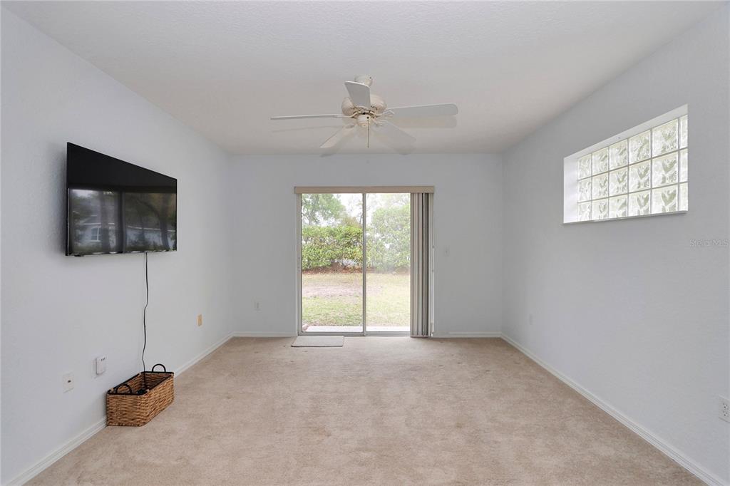 6318 Southwest 117th Loop Ocala, FL 34476 - Photo 35 of 60 a view of empty room with windows