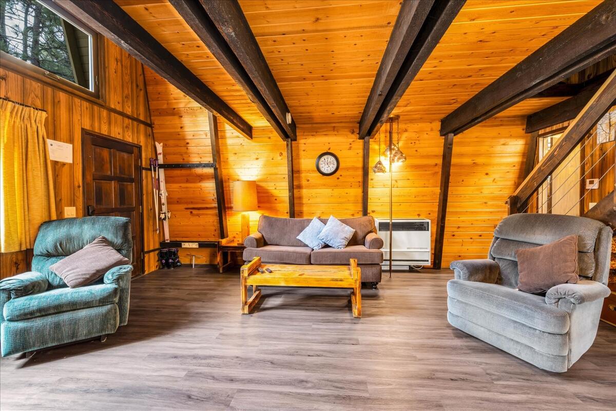39656 Forest Road Big Bear Lake, CA 92315 - Photo 9 of 40 a living room with furniture and a large window