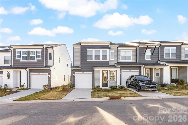 a front view of a building with a street