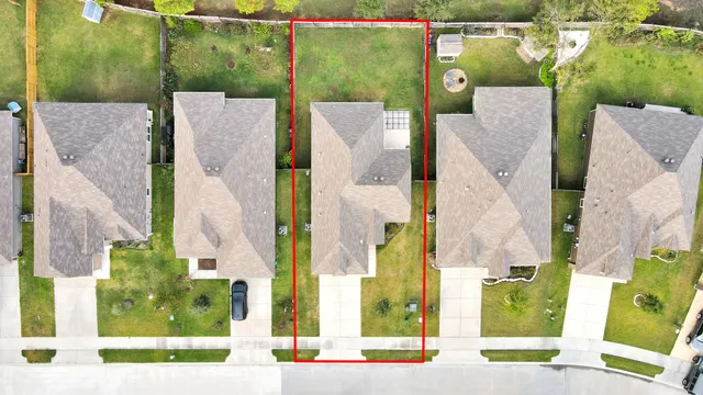 front view of a house with a garden