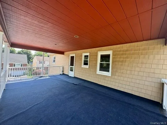a view of a porch in front of a house