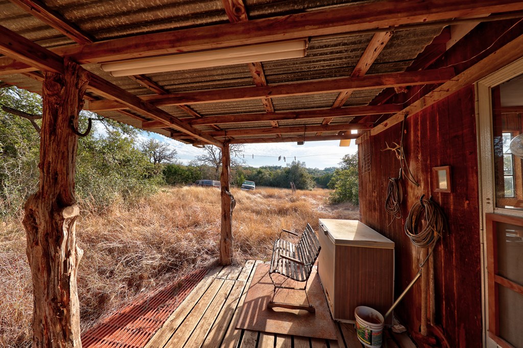 438-1 Yellowstone Lane Hunt, TX 78024 - Photo 44 of 44 a view of a room with wooden walls