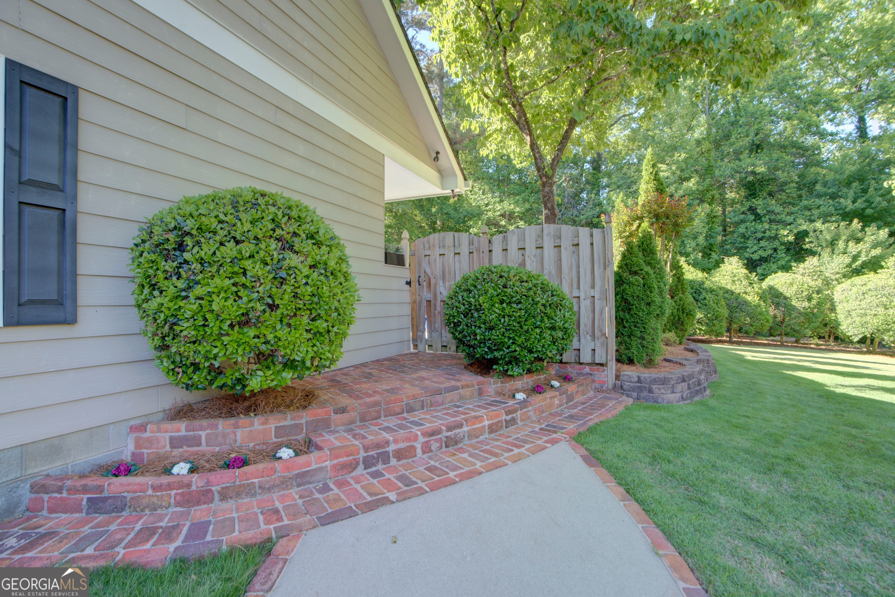 204 Green View Road Southwest Rome, GA 30165 - Photo 62 of 62 a view of a backyard with potted plants and large tree