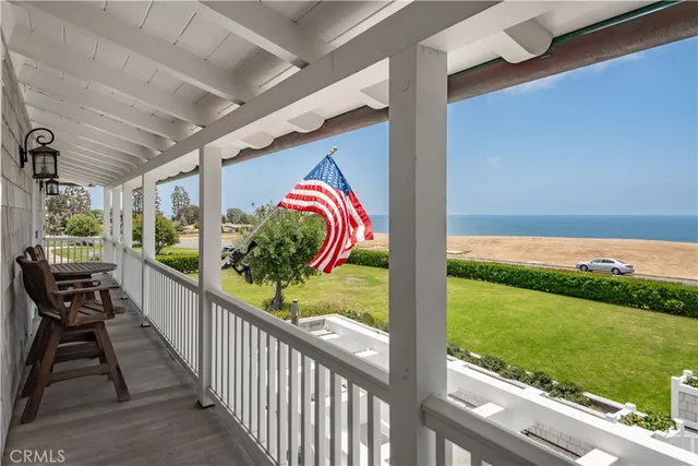 a view of a porch and garden