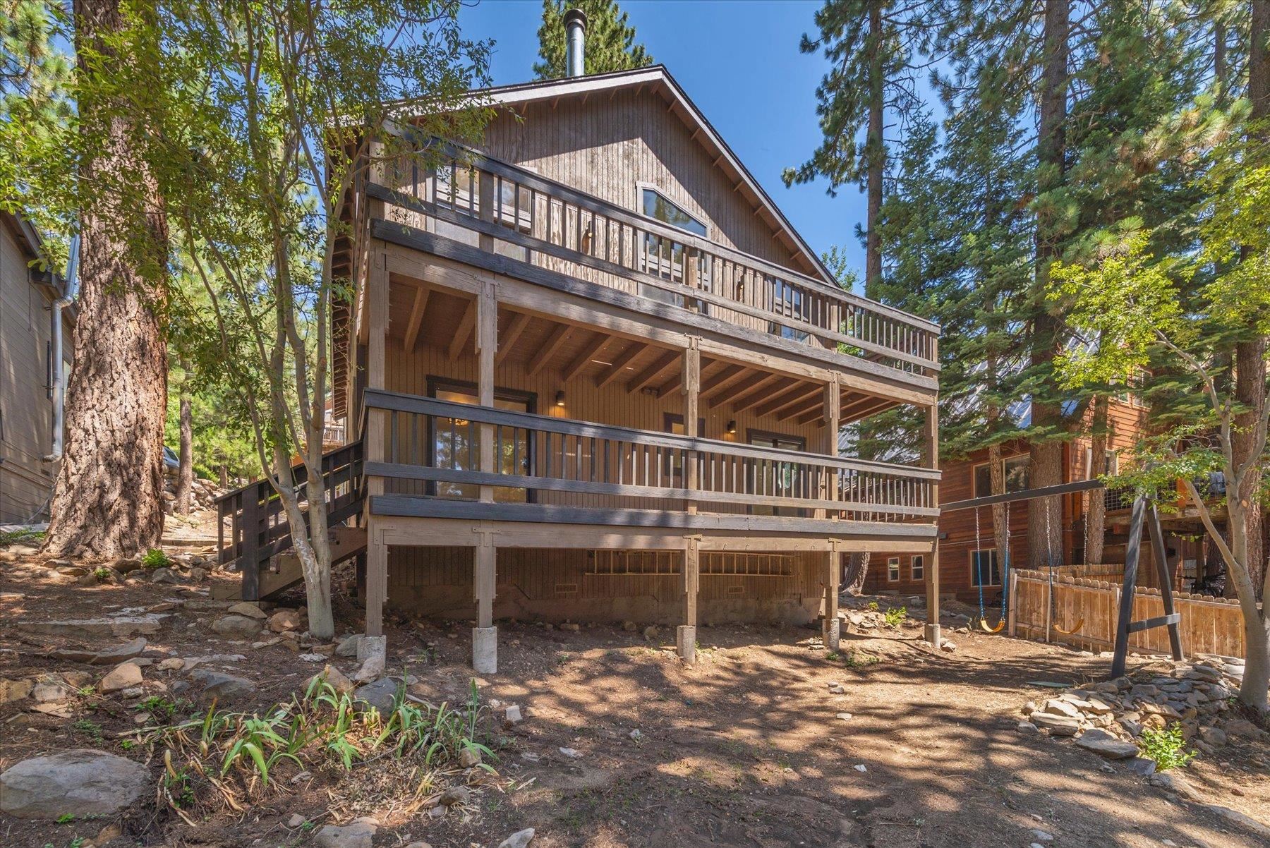 12839 Palisade Street Truckee, CA 96161 - Photo 1 of 21 a view of a house with a yard