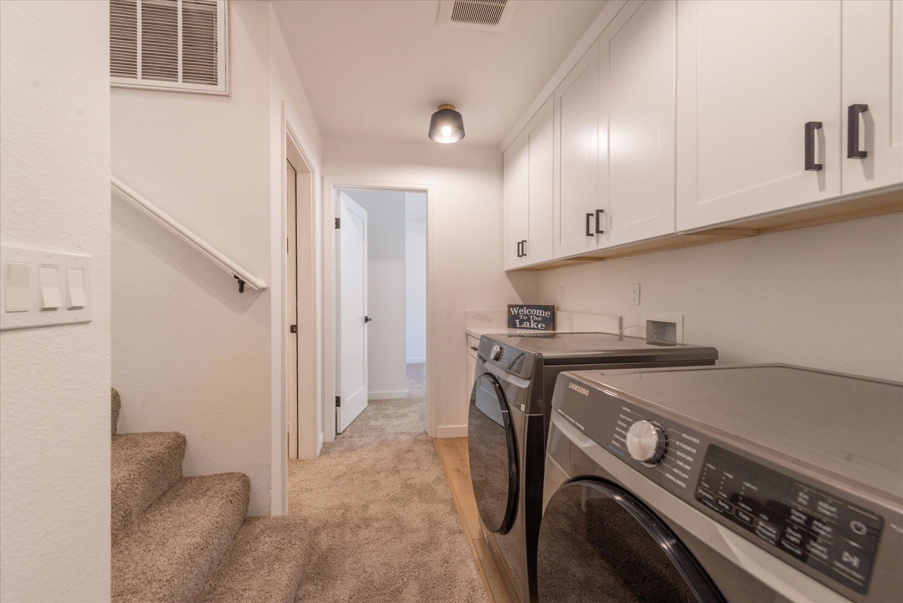 12839 Palisade Street Truckee, CA 96161 - Photo 12 of 21 a utility room with dryer and washer
