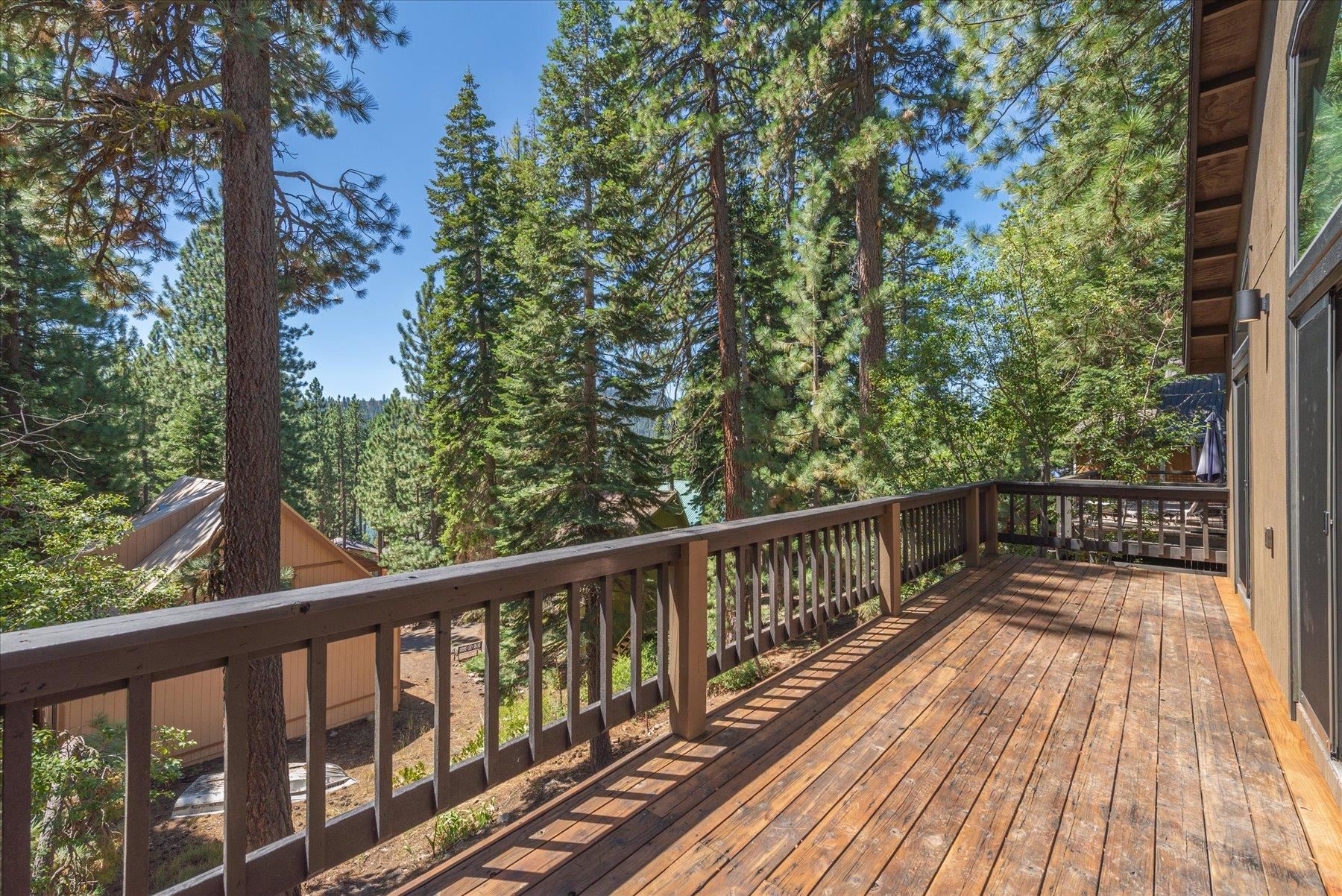 12839 Palisade Street Truckee, CA 96161 - Photo 3 of 21 a view of balcony with wooden floor and fence