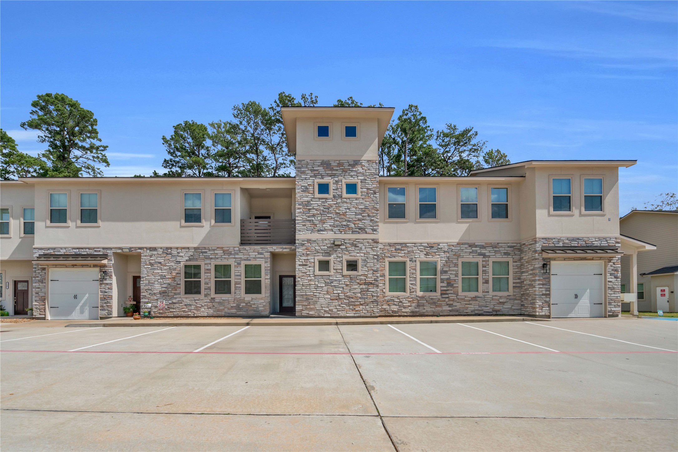 504 Nursery Road, Unit 2210 Spring, TX 77380 - Photo 1 of 38 The condo is located on the 2nd floor at the head of the stairs in the picture and goes to the end of the building.