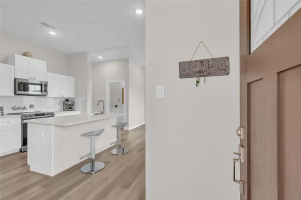 a view of front door with a bathroom