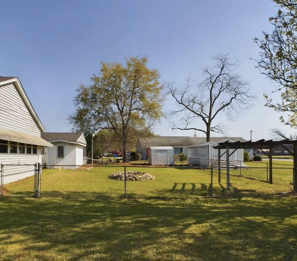 102 Ellis Street Wrens, GA 30833 - Photo 3 of 30 Ellise St Side Yard 2