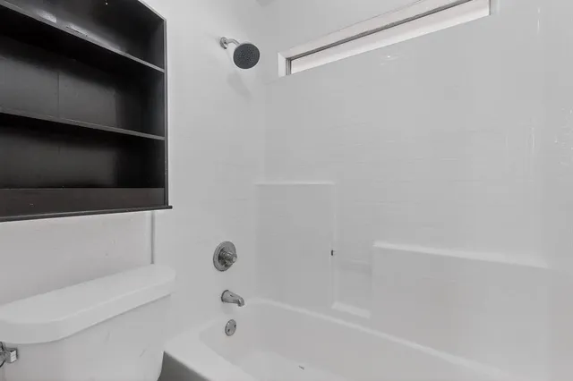 a bathroom with a bathtub