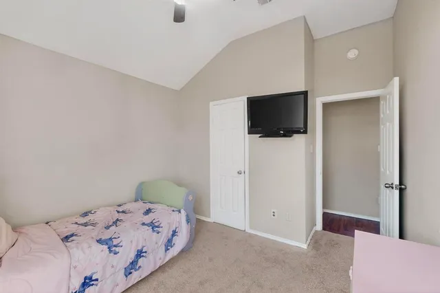 a room with furniture and white walls