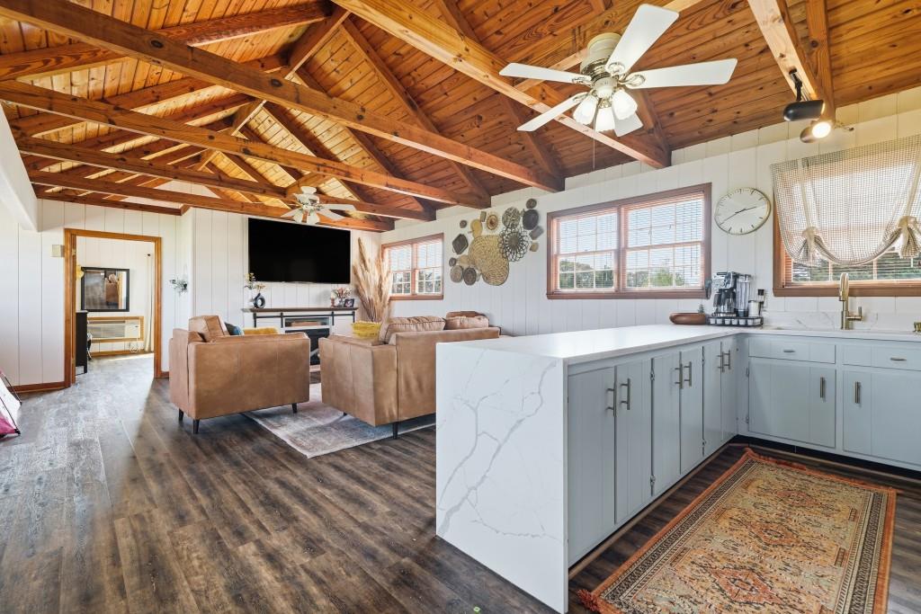 398 South 6th St Extension Milner, GA 30257 - Photo 20 of 30 a kitchen with a sink appliances and cabinets