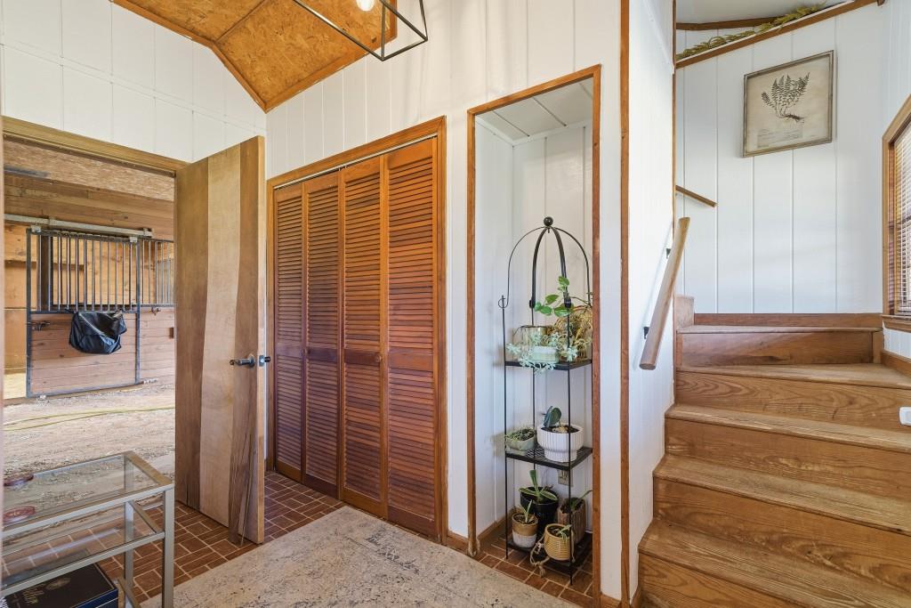 398 South 6th St Extension Milner, GA 30257 - Photo 24 of 30 a view of a hallway with wooden floor and staircase
