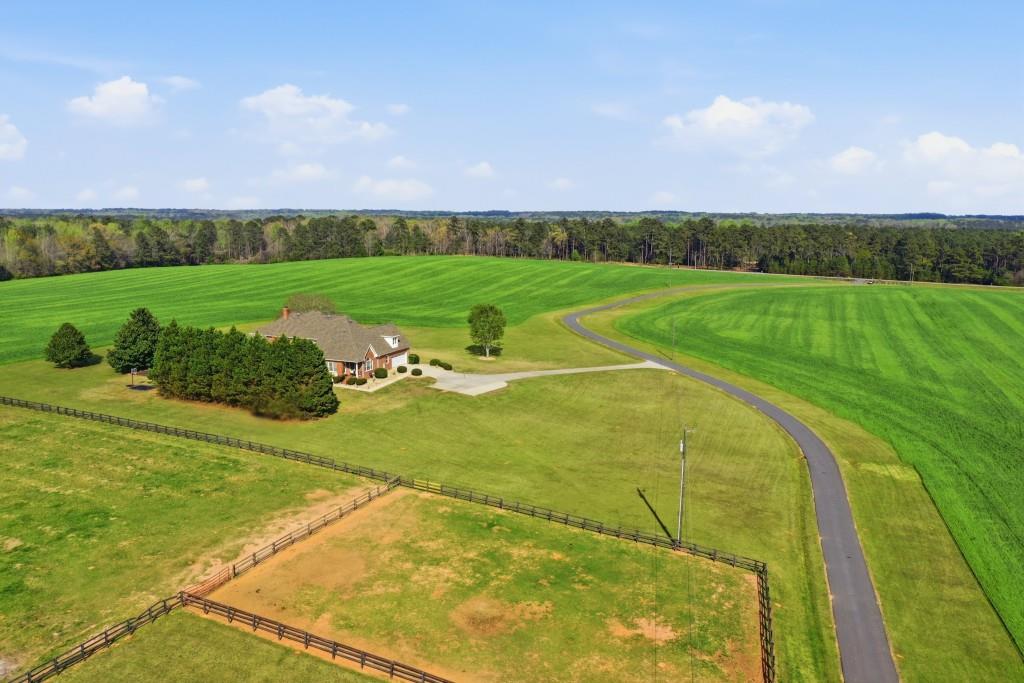 398 South 6th St Extension Milner, GA 30257 - Photo 30 of 30 a view of a golf course with a big yard