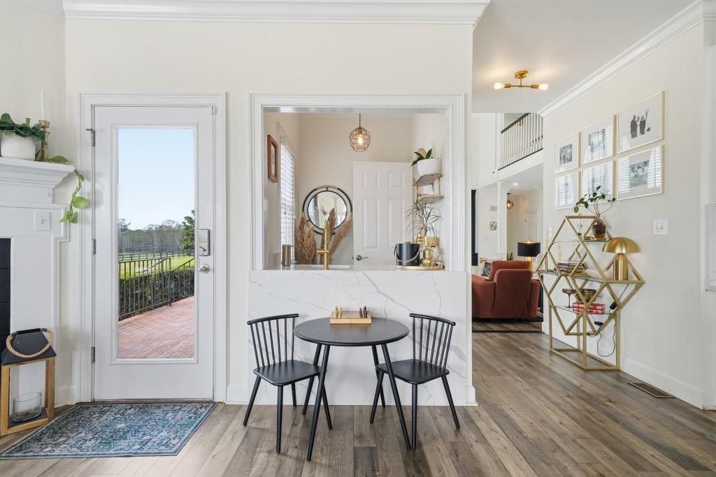 398 South 6th St Extension Milner, GA 30257 - Photo 9 of 30 a view of a livingroom with furniture and hardwood floor
