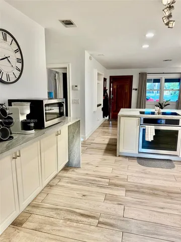 a lobby with furniture and window