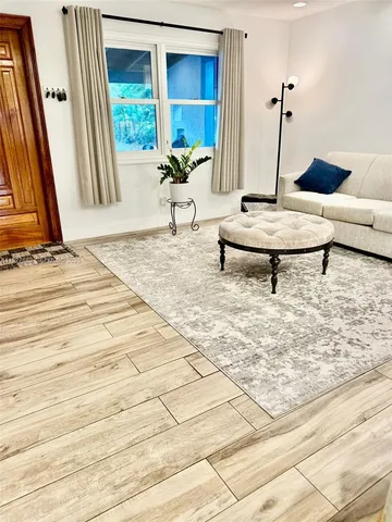 a living room with a couch and a table