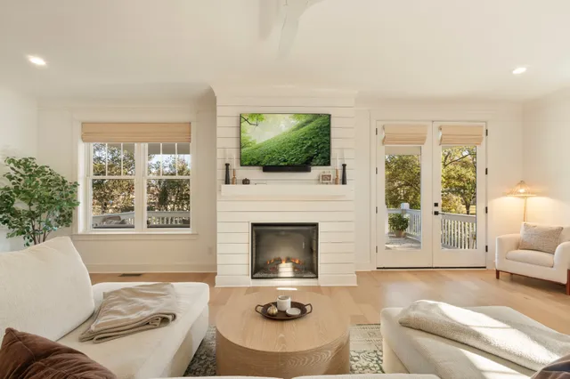 a bathroom with a double vanity sink mirror and shower