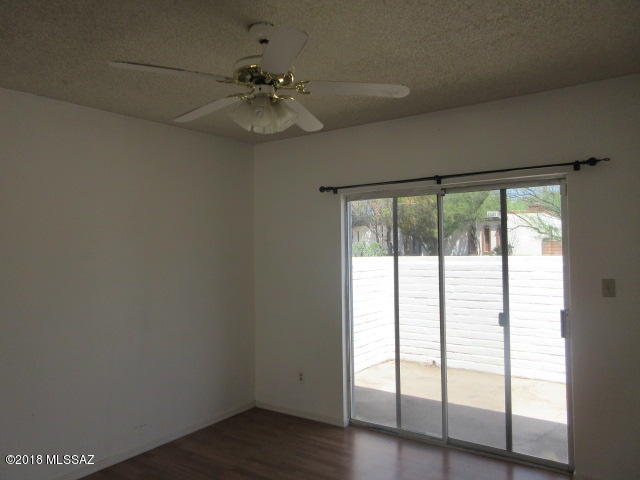 403 Curry Street Rio Rico, AZ 85648 - Photo 21 of 23 a view of an empty room with a window