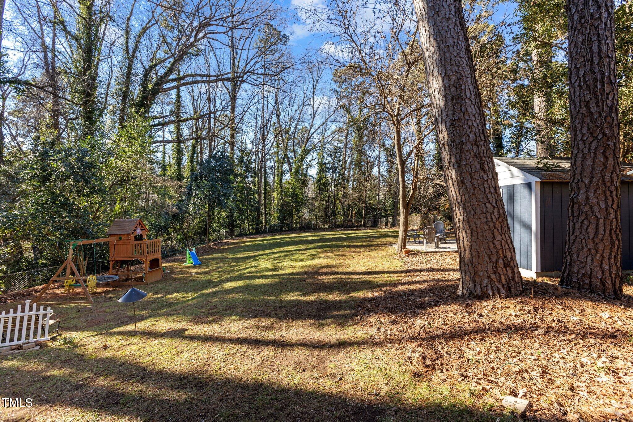 1325 Duplin Road Raleigh, NC 27607 - Photo 35 of 46 Broad scope of Backyard shows the depth.