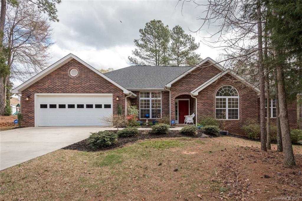 4630 Old Hickory Road Lancaster, SC 29720 - Photo 1 of 22 a front view of a house with a yard and garage