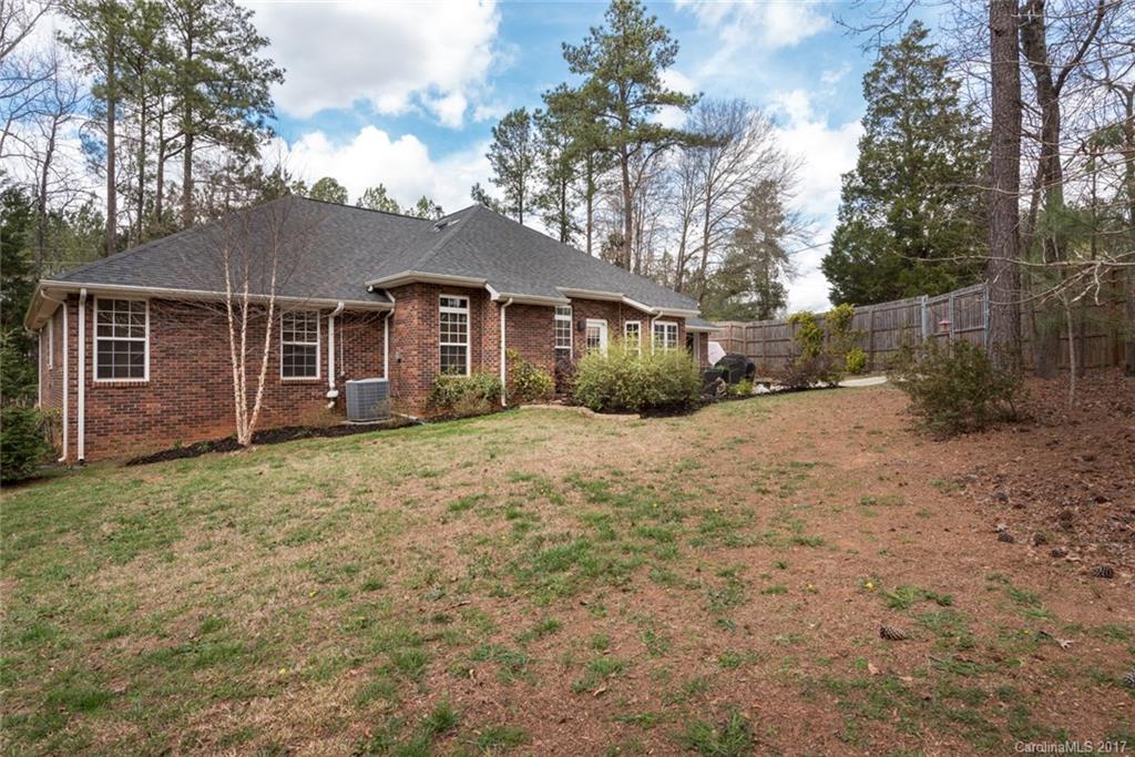 4630 Old Hickory Road Lancaster, SC 29720 - Photo 19 of 22 a view of a yard in front of a house with large tree