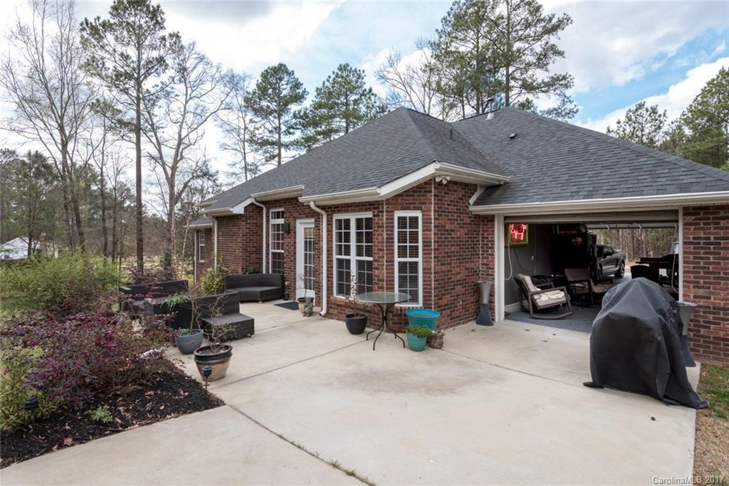 4630 Old Hickory Road Lancaster, SC 29720 - Photo 20 of 22 a view of a house with sitting area and garden