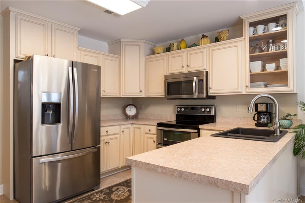 4630 Old Hickory Road Lancaster, SC 29720 - Photo 4 of 22 a kitchen with stainless steel appliances and a refrigerator