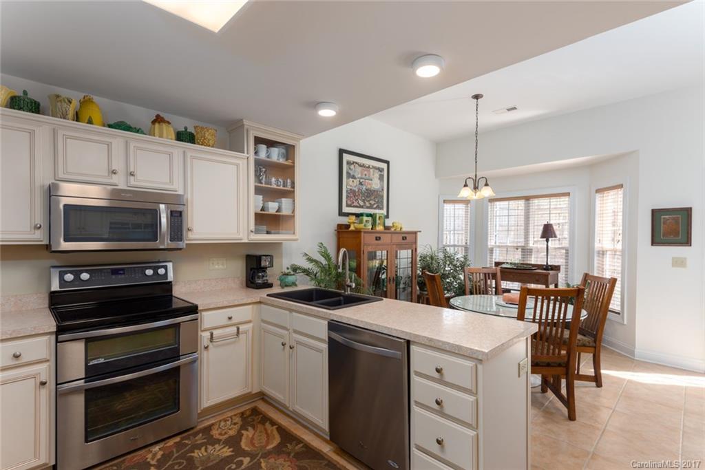4630 Old Hickory Road Lancaster, SC 29720 - Photo 5 of 22 a kitchen with a sink stainless steel appliances and cabinets