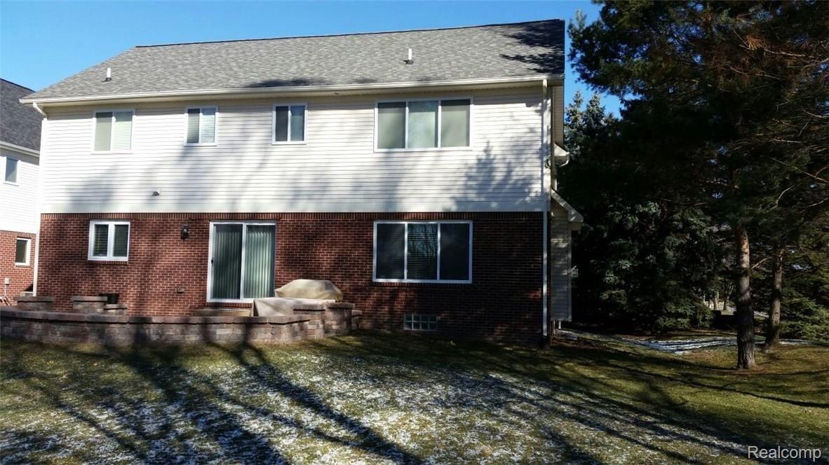 1976 South Shore Drive Rochester, MI 48307 - Photo 31 of 31 30 House Back.jpg