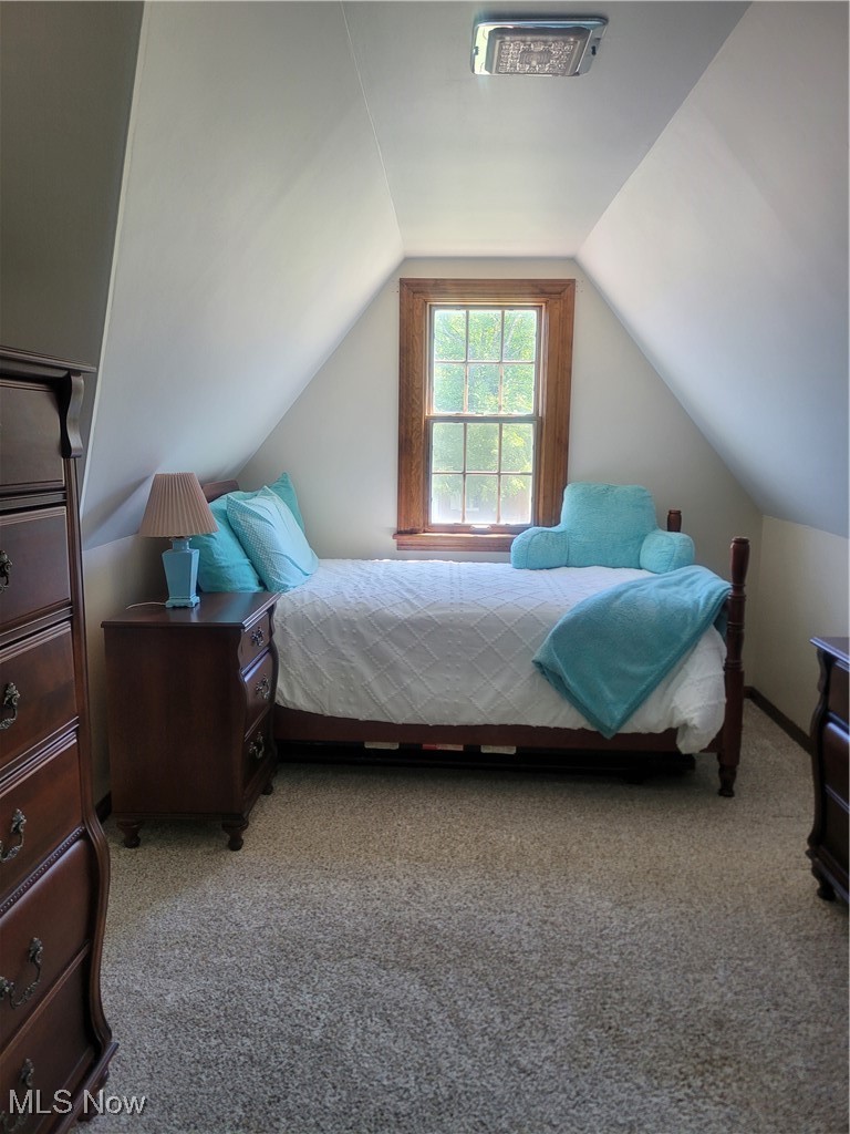 1372 Mayfield Ridge Road Cleveland, OH 44124 - Photo 15 of 37 Bedroom featuring carpeted floors and built-ins