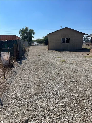 a view of an empty room with windows
