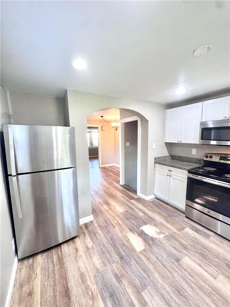 5454 Camp Meeting Road Center Valley, PA 18034 - Photo 12 of 27 Modern kitchen with granite counters and stainless steel appliances.