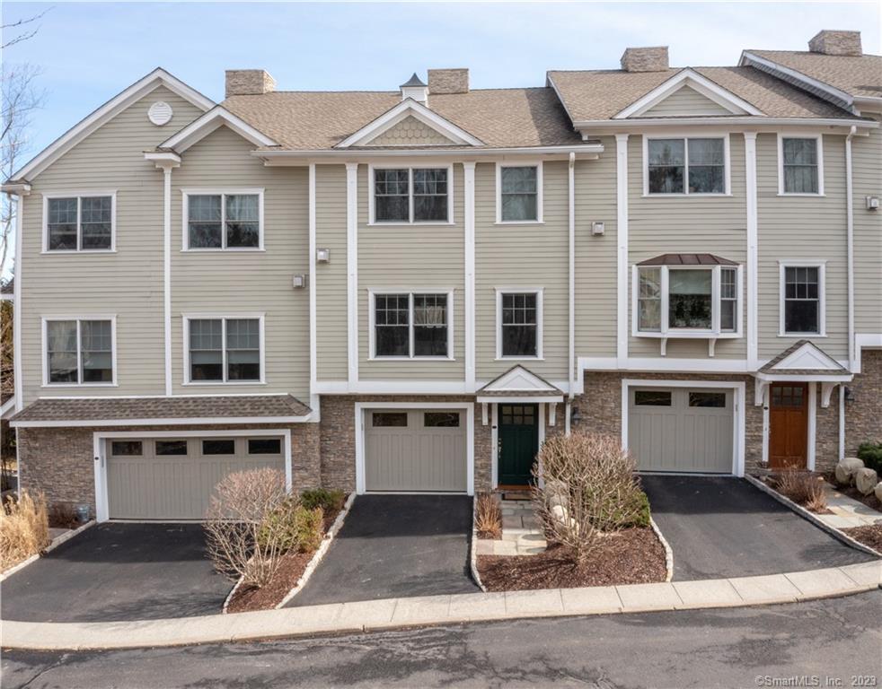 66 Grove Street, Unit B9 Ridgefield, CT 06877 - Photo 1 of 1 a front view of a large white building