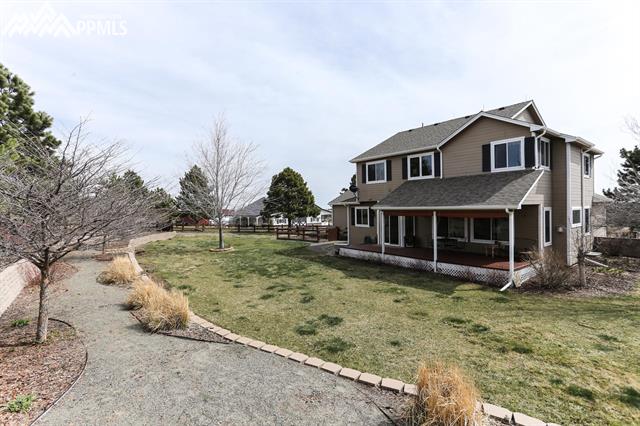 42745 Pearson Ranch Loop Parker, CO 80138 - Photo 29 of 36 Back Yard with Walking Path