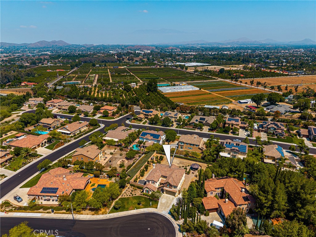 12652 Twin Peak Court Riverside, CA 92503 - Photo 52 of 55 an aerial view of residential building and lake