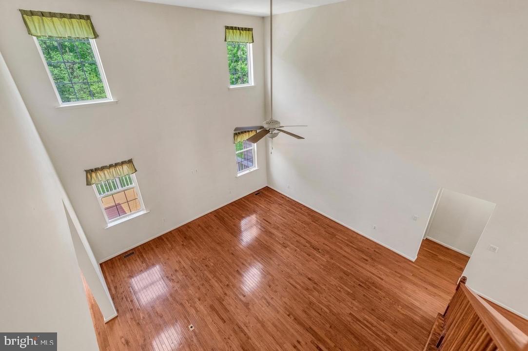 18776 Pier Trail Drive Triangle, VA 22172 - Photo 9 of 32 an empty room with windows
