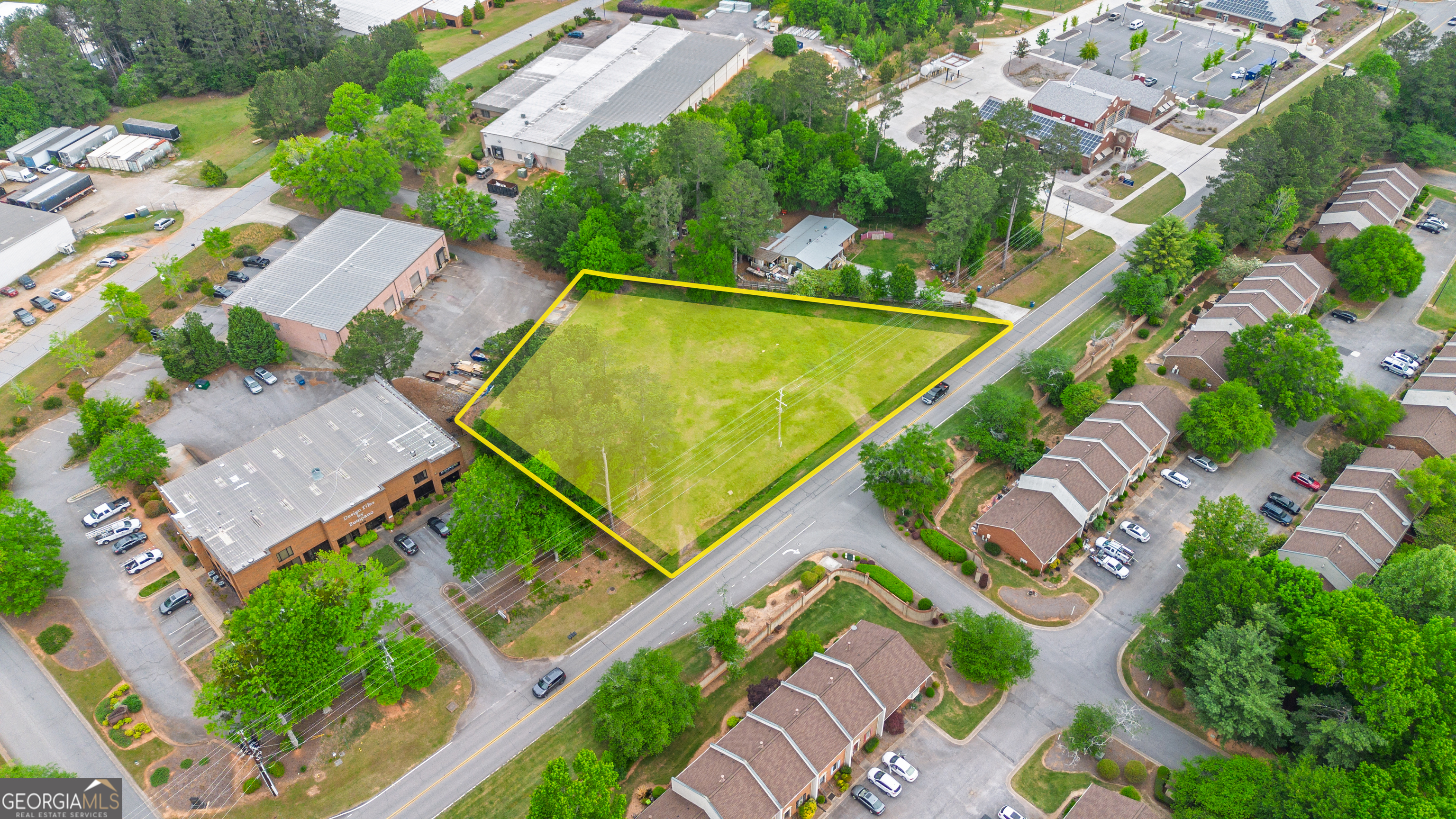 235 Cleveland Road Bogart, GA 30622 - Photo 12 of 24 an aerial view of a house with a garden and swimming pool