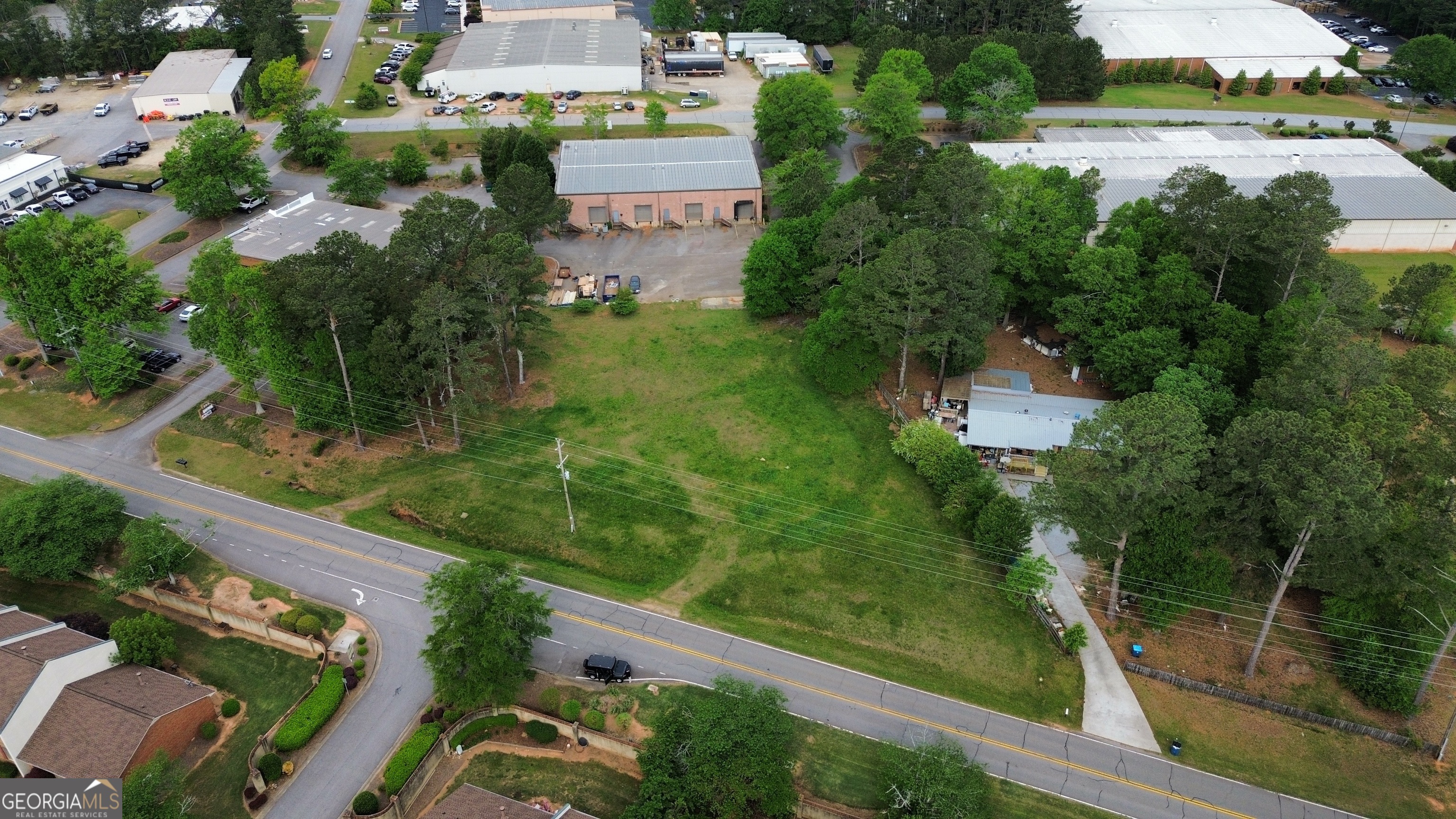 235 Cleveland Road Bogart, GA 30622 - Photo 14 of 24 an aerial view of residential houses with outdoor space and street view