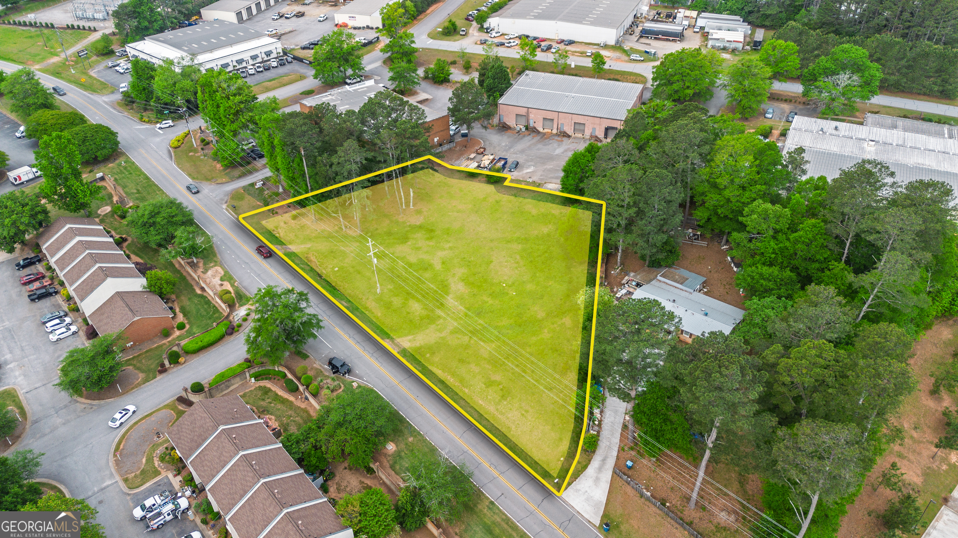 235 Cleveland Road Bogart, GA 30622 - Photo 2 of 24 an aerial view of swimming pool with a garden view