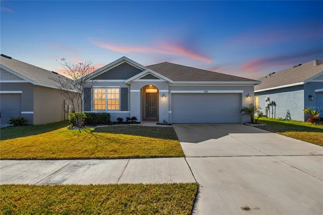 a view of outdoor space yard and front view of a house