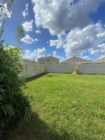 a view of a terrace with sitting area