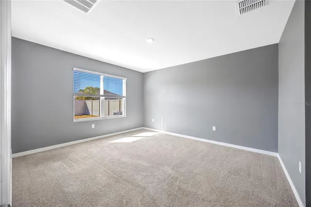 a front view of a house with swimming pool